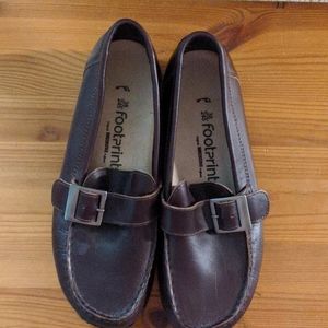 Brown Birkenstock Footprints